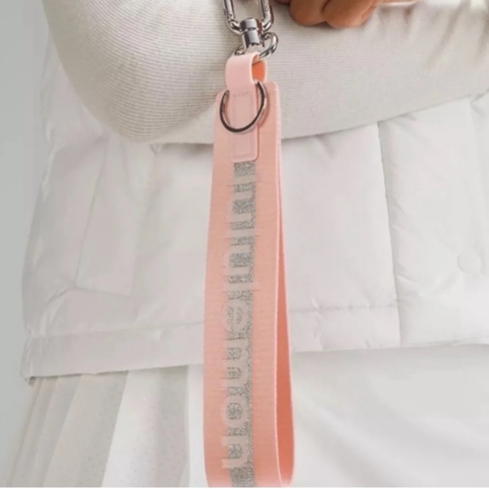 Lululemon Never Lost Pink Mist, silver logo keychain lanyard